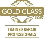 A team of skilled car repair professionals working on a luxury vehicle in a well-equipped garage