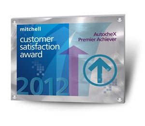 Autotaxx Customer Satisfaction Award 2012, showcasing a trophy with a gold star on a wooden base